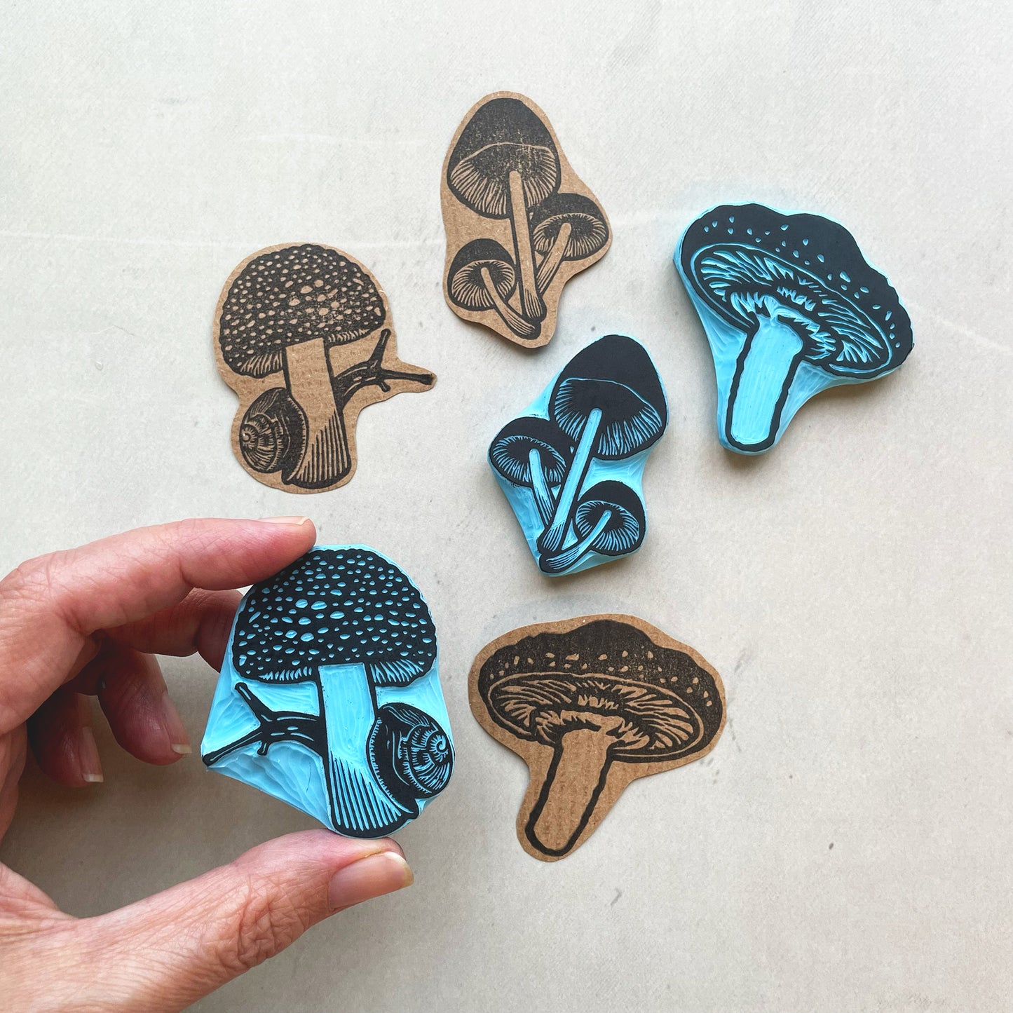Hand carved rubber stamps of mushrooms