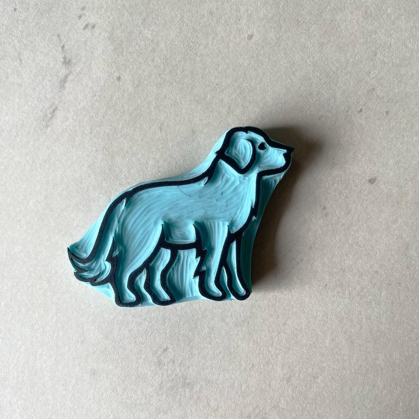 Outlined image of a labrador dog made into a rubber stamp
