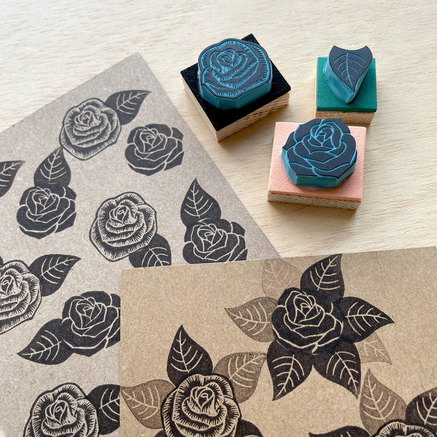 Rose stamp set on paper with stamp impressions