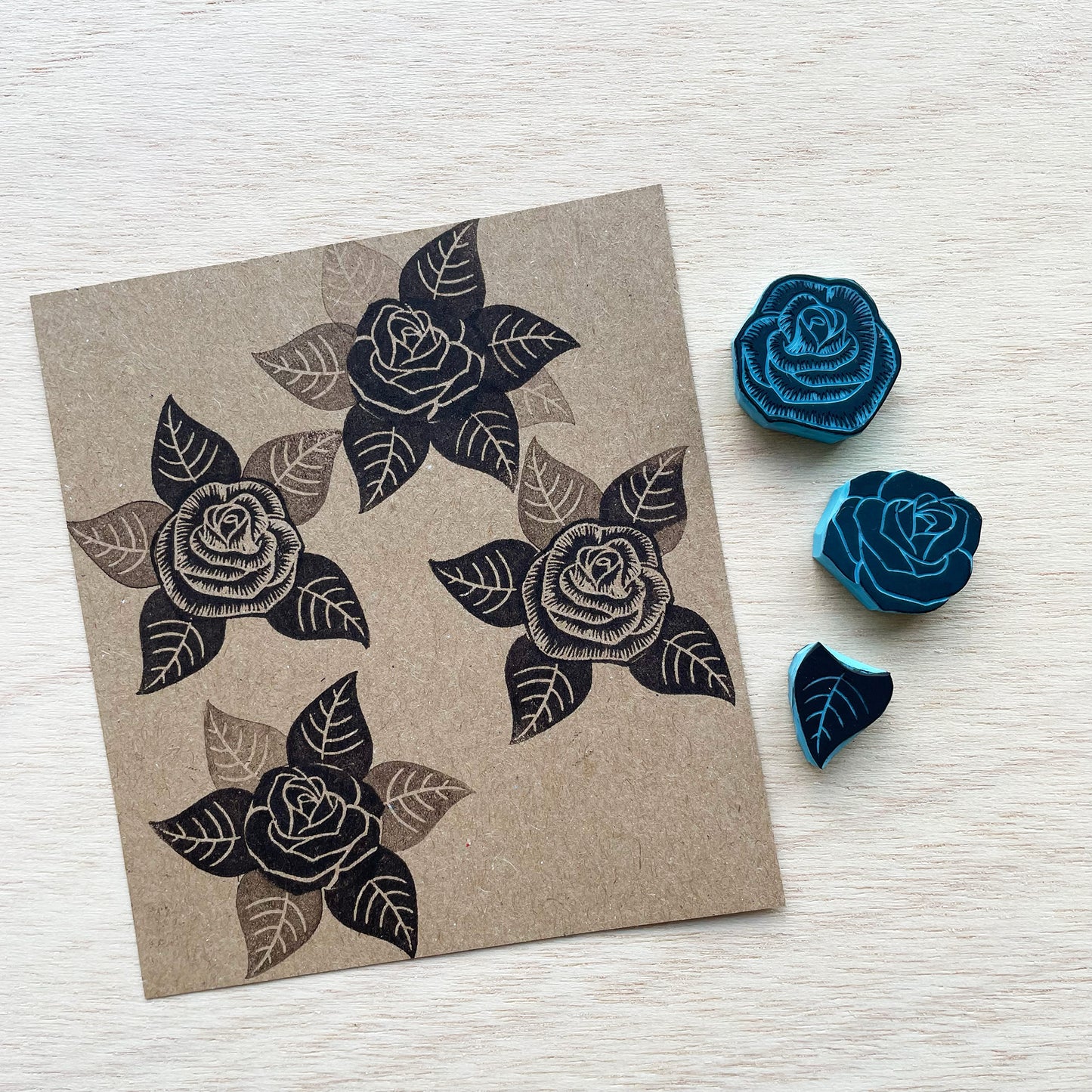 Small rubber stamps of roses and leaf to mix and match