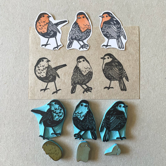 Bird-themed stamps and die-cut shapes on a beige background