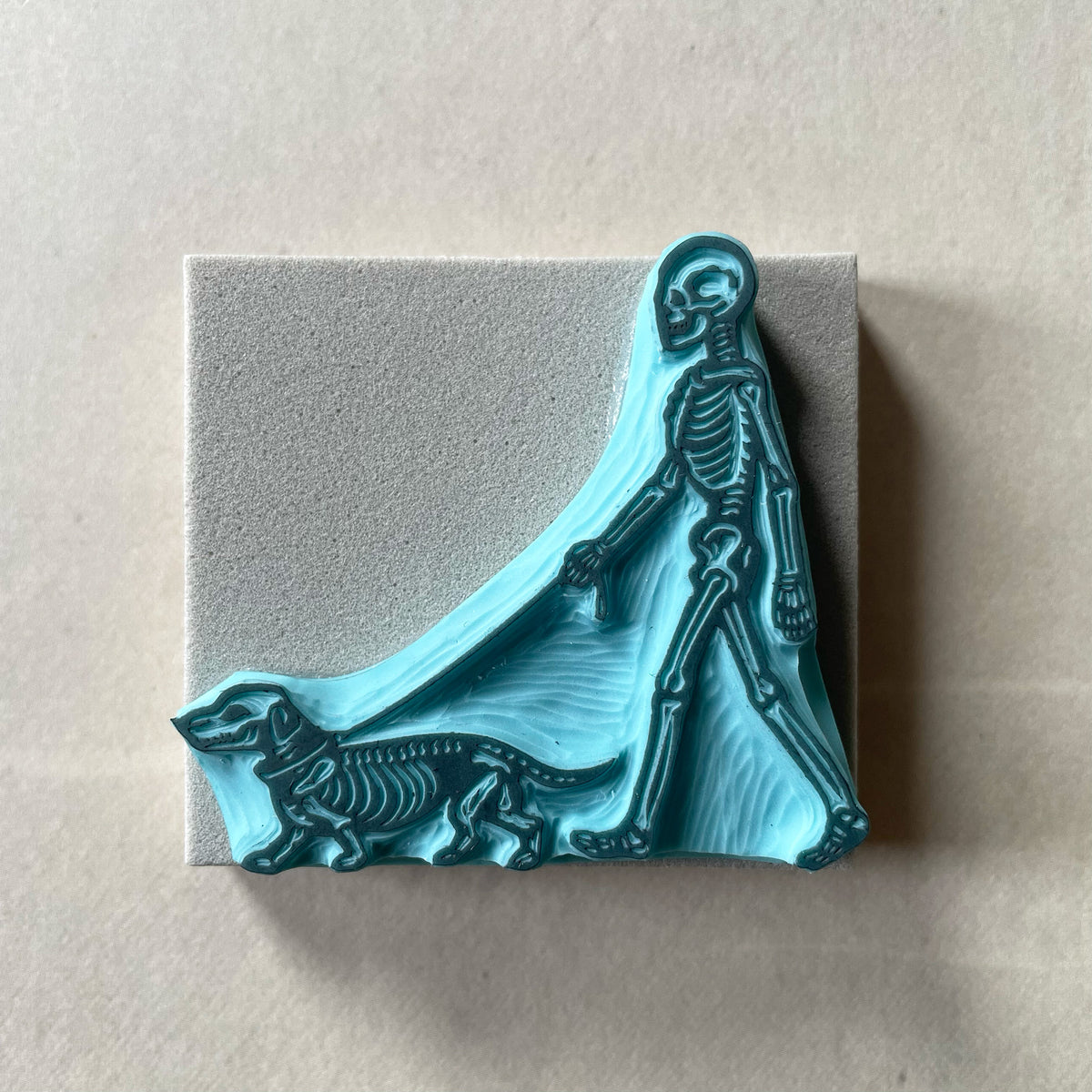 Skeleton walking a dog rubber stamps on a graveyard for Halloween spooky-cute stamping