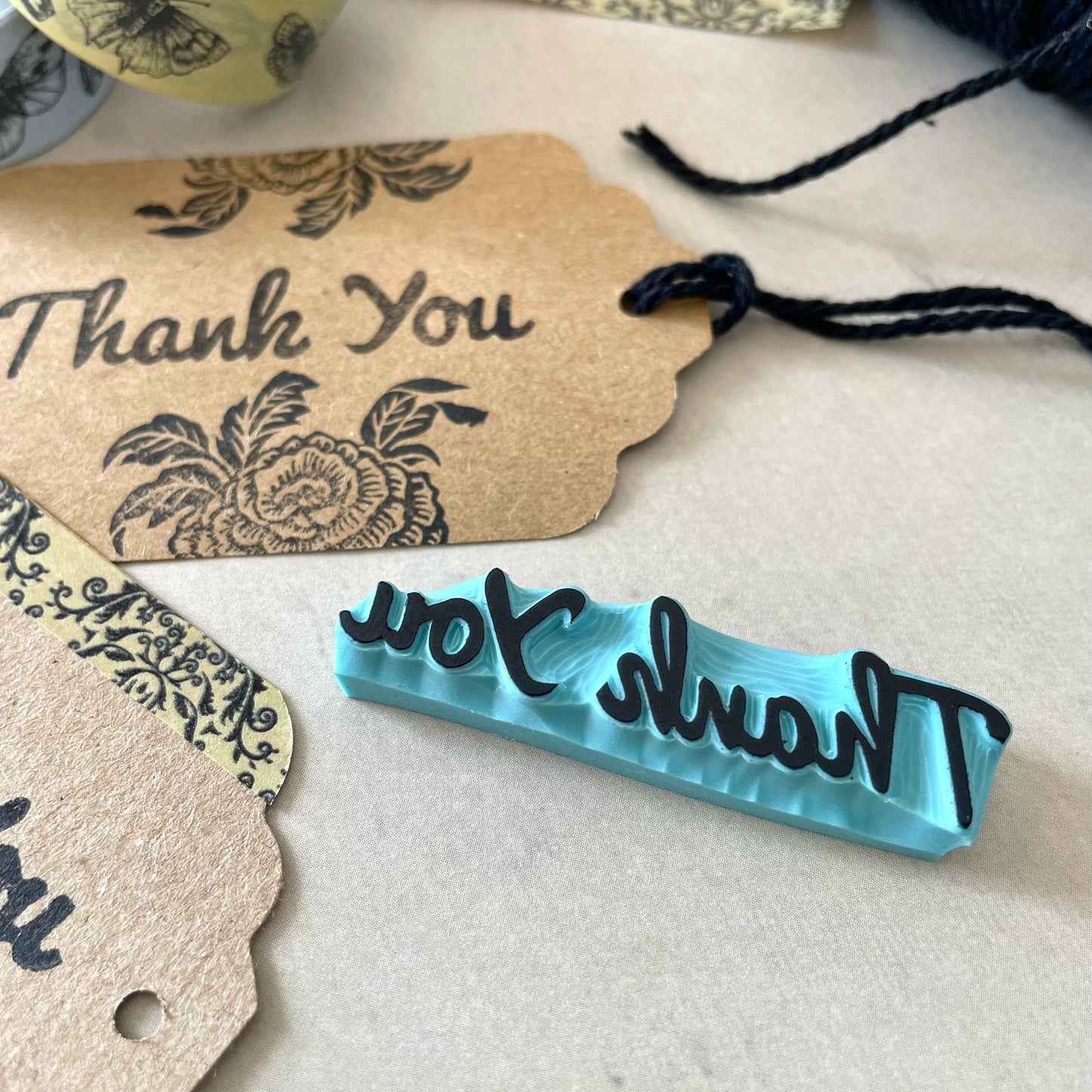 Hand carved rubber stamp of a Thank You word