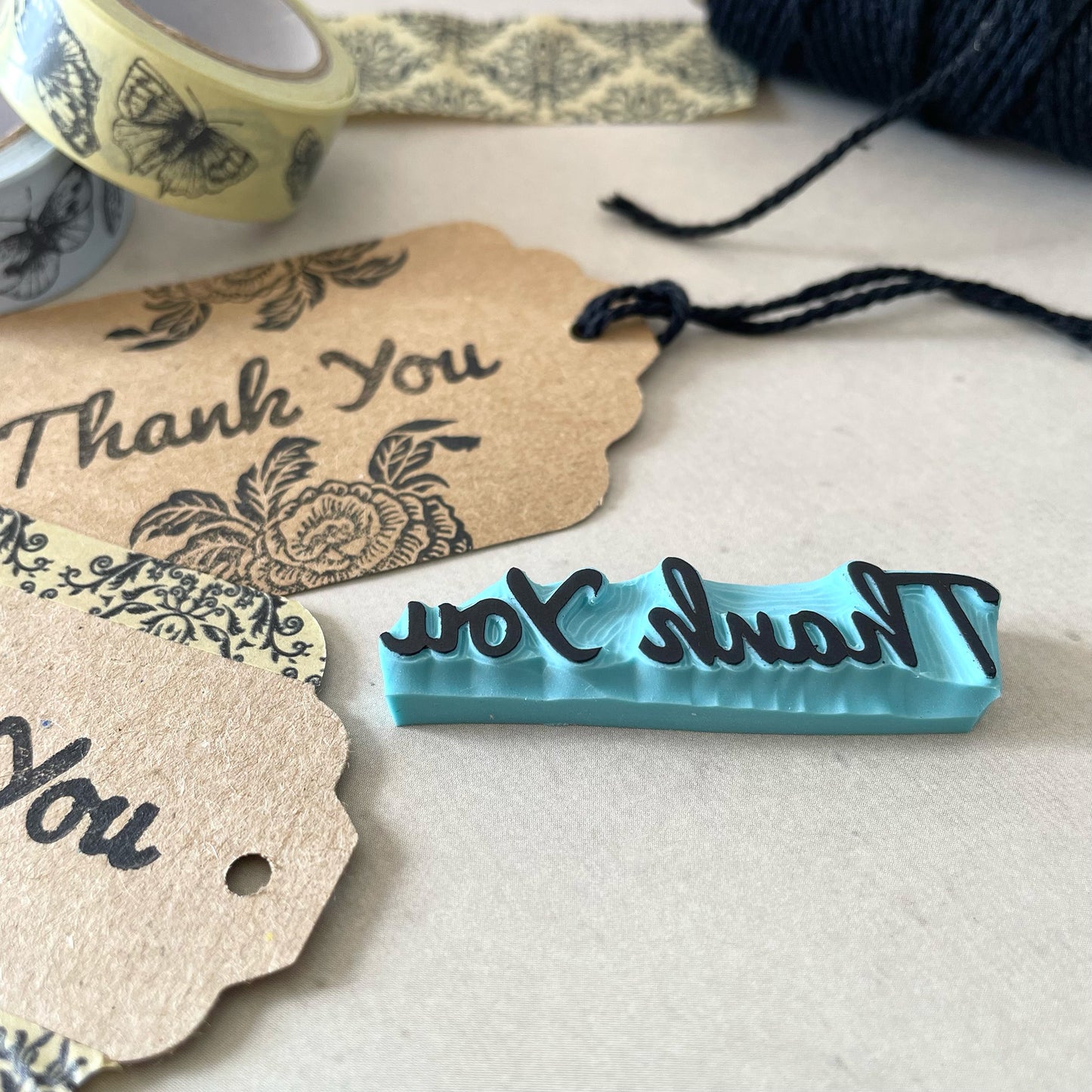 Hand carved rubber stamp of a Thank You word